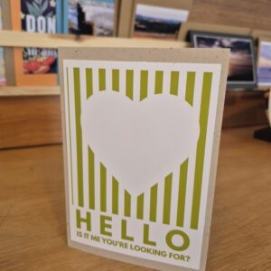 Card with green stripes and a white heart "Hello, is it me you're looking for" words at the bottom